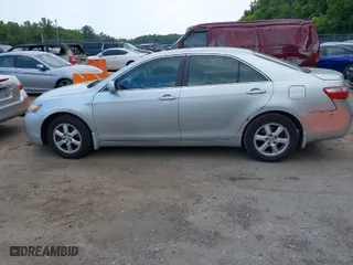 2007 Toyota Camry CE with VIN 4T1BE46K77U140703, listed as a IAAI auction lot 40193348 with 183,987 mi miles. Bid and sale history available at carsss.com. Image 14.