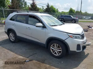 2014 Kia Sorento LX with VIN 5XYKT4A75EG512812, listed as a IAAI auction lot 42624059 with 119,183 mi miles and . Bid and sale history available at DreamBid. Image 1.