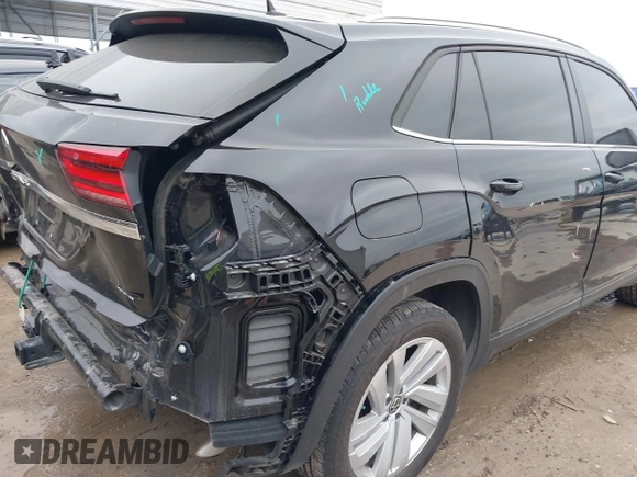 2023 Volkswagen Atlas SE z VIN 1V2KE2CA8PC225834, wystawiony jako IAAI lot #41330975 z przebiegiem 13 629 mil mil oraz . Historia ofert i sprzedaży dostępna na DreamBid. Obrazek 6.