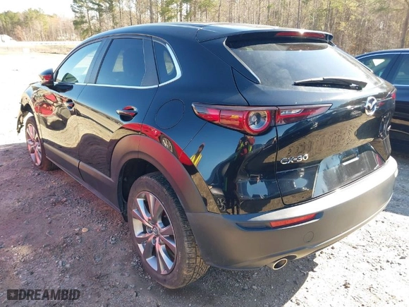2021 Mazda CX-30 Select with VIN 3MVDMABLXMM254691, listed as a IAAI auction lot 41823081 with 80,082 mi miles. Bid and sale history available at carsss.com. Image 3.