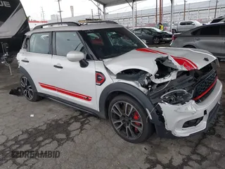 2024 MINI Countryman John Cooper Works z VIN WMZ33BS03R3R53245, wystawiony jako IAAI lot #41759752 z przebiegiem 22 574 mil mil oraz . Historia ofert i sprzedaży dostępna na DreamBid. Obrazek 1.