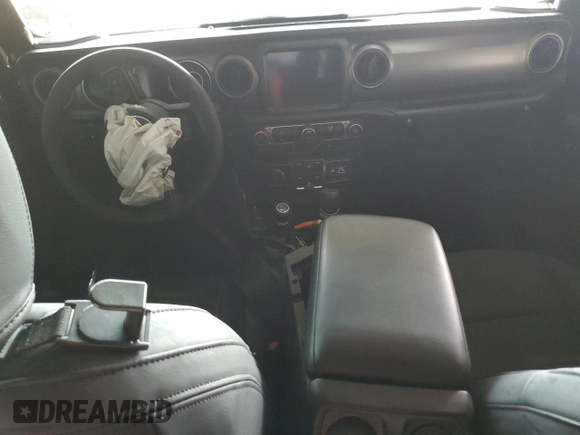 2023 Jeep Wrangler Sport S with VIN 1C4HJXDG0PW668162, listed as a Copart auction lot 45942865 with 62,944 mi miles and Salvage Title. Bid and sale history available at DreamBid. Image 8.