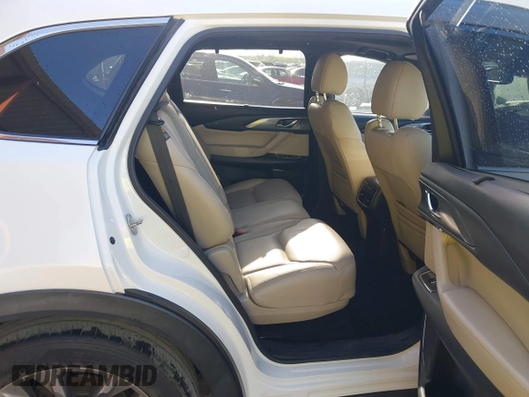 2016 Mazda CX-9 Grand Touring z VIN JM3TCADY6G0125547, wystawiony jako IAAI lot #41997445 z przebiegiem 129 179 mil mil oraz . Historia ofert i sprzedaży dostępna na DreamBid. Obrazek 8.
