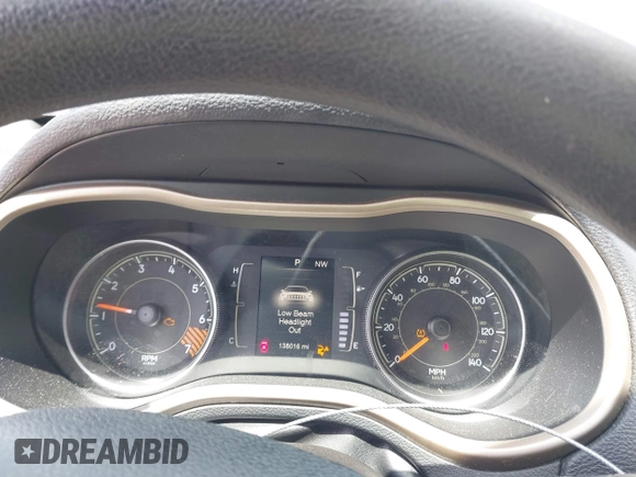 2015 Jeep Cherokee Sport with VIN 1C4PJLAB2FW566132, listed as a IAAI auction lot 42103012 with 138,016 mi miles. Bid and sale history available at carsss.com. Image 7.