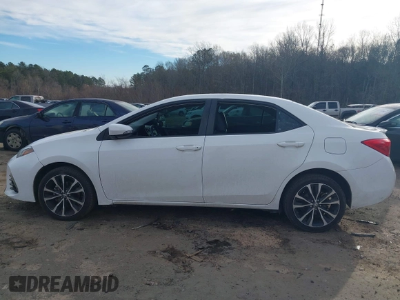 2017 Toyota Corolla L z VIN 5YFBURHE6HP632388, wystawiony jako IAAI lot #41299135 z przebiegiem 84 130 mil mil oraz . Historia ofert i sprzedaży dostępna na DreamBid. Obrazek 14.