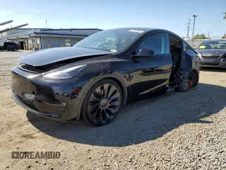 2023 Tesla Model Y Performance z VIN 7SAYGDEF9PF835547, wystawiony jako Copart lot #52979335 z przebiegiem 52 251 mil mil oraz Szkoda całkowita • Salvage title. Historia ofert i sprzedaży dostępna na DreamBid. Obrazek 1.