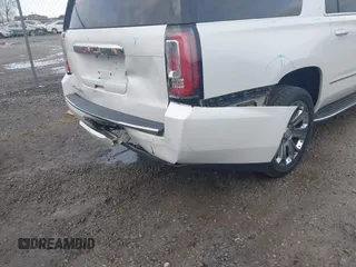 2016 GMC Yukon XL Denali with VIN 1GKS2HKJ9GR264481, listed as a IAAI auction lot 41764272 with 114,852 mi miles. Bid and sale history available at carsss.com. Image 6.