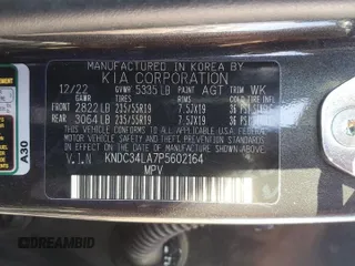 2023 Kia EV6 Wind with VIN KNDC34LA7P5602164, listed as a Copart auction lot 74350274 with 53,604 mi miles and Clean Title. Bid and sale history available at carsss.com. Image 14.