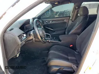 2023 Honda Civic Sport with VIN 2HGFE2F57PH511027, listed as a Copart auction lot 62703695 with 33,899 mi miles and Salvage title. Bid and sale history available at DreamBid. Image 7.
