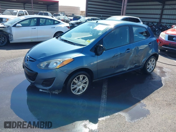 2014 Mazda 2 Sport with VIN JM1DE1KY0E0181555, listed as a IAAI auction lot 41539841 with 121,918 mi miles and . Bid and sale history available at DreamBid. Image 17.