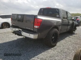 2010 Nissan Titan LE with VIN 1N6BA0EC1AN325055, listed as a Copart auction lot 51471785 with 137,110 mi miles and Salvage Title. Bid and sale history available at carsss.com. Image 3.
