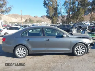 2011 Volkswagen Jetta SE with VIN 3VWDZ7AJ7BM318623, listed as a IAAI auction lot 41131568 with 130,799 mi miles and . Bid and sale history available at DreamBid. Image 13.