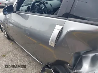 2006 Nissan 350Z Touring z VIN JN1AZ34D56M331590, wystawiony jako IAAI lot #42361928 z przebiegiem Nie podano mil oraz . Historia ofert i sprzedaży dostępna na DreamBid. Obrazek 16.