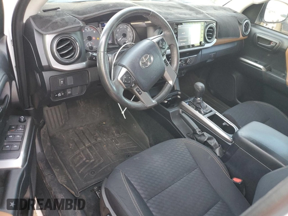 2020 Toyota Tacoma SR5 z VIN 3TMAZ5CN2LM115831, wystawiony jako Copart lot #59134155 z przebiegiem 116 532 mil mil oraz Szkoda całkowita • Salvage title. Historia ofert i sprzedaży dostępna na DreamBid. Obrazek 8.