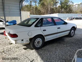 1992 Ford Taurus GL with VIN 1FALP52U5NA280821, listed as a Copart auction lot 77457304 with 33,484 mi miles and Salvage Title. Bid and sale history available at carsss.com. Image 3.