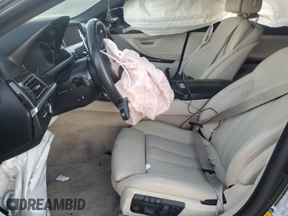 2015 BMW 6 Series 640i z VIN WBA6A0C59FD318390, wystawiony jako Copart lot #87831165 z przebiegiem Nie podano mil oraz Szkoda całkowita • Salvage title. Historia ofert i sprzedaży dostępna na DreamBid. Obrazek 7.