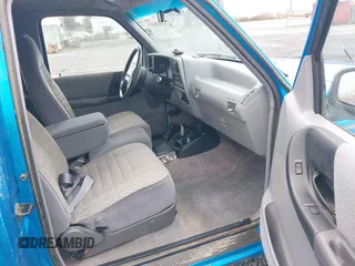 1993 Ford Ranger XLT z VIN 1FTCR15X7PPA62866, wystawiony jako IAAI lot #41838013 z przebiegiem 85 362 mil mil oraz . Historia ofert i sprzedaży dostępna na DreamBid. Obrazek 5.