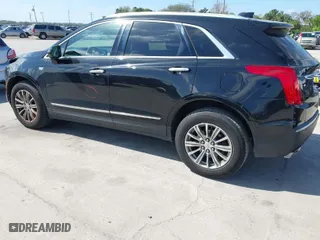 2018 Cadillac XT5 Luxury FWD with VIN 1GYKNCRS5JZ121954, listed as a IAAI auction lot 41627999 with NaN miles. Bid and sale history available at carsss.com. Image 3.
