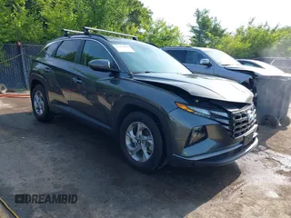 2022 Hyundai Tucson SEL z VIN 5NMJB3AE6NH041332, wystawiony jako IAAI lot #42473003 z przebiegiem 87 498 mil mil oraz . Historia ofert i sprzedaży dostępna na DreamBid. Obrazek 1.