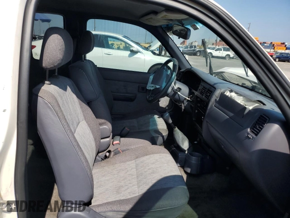 1999 Toyota Tacoma z VIN 4TAVL52N7XZ567598, wystawiony jako Copart lot #55141495 z przebiegiem 225 505 mil mil oraz Szkoda całkowita • Salvage title. Historia ofert i sprzedaży dostępna na DreamBid. Obrazek 10.