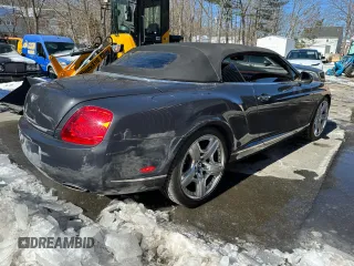 2010 Bentley Continental GT with VIN SCBDR3ZA9AC066604, listed as a Copart auction lot 46725805 with 59,156 mi miles and Salvage Title. Bid and sale history available at DreamBid. Image 4.