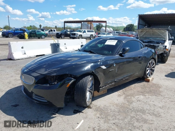 2011 BMW Z4 sDrive35i with VIN WBALM7C58BE383710, listed as a IAAI auction lot 41953452 with 102,510 mi miles. Bid and sale history available at carsss.com. Image 6.