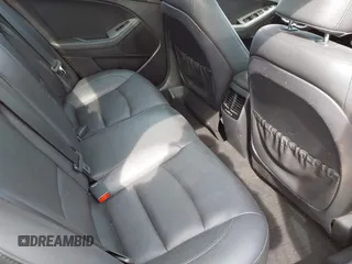 2014 Kia Optima SXL Turbo with VIN 5XXGR4A66EG307497, listed as a IAAI auction lot 42020082 with 134,736 mi miles and . Bid and sale history available at DreamBid. Image 8.