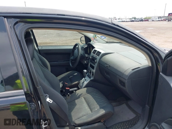 2008 Dodge Caliber SE with VIN 1B3HB28B08D659538, listed as a IAAI auction lot 42083010 with 263,118 mi miles. Bid and sale history available at carsss.com. Image 5.