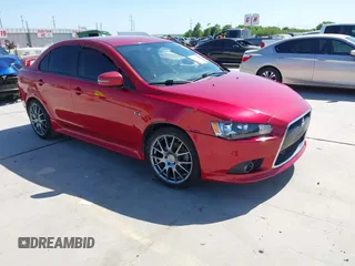 2015 Mitsubishi Lancer GT with VIN JA32U8FW9FU014308, listed as a IAAI auction lot 41982416 with 227,574 mi miles. Bid and sale history available at carsss.com. Image 1.