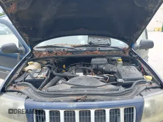 2004 Jeep Grand Cherokee Laredo z VIN 1J4GW48S94C363700, wystawiony jako IAAI lot #42372081 z przebiegiem Nie podano mil oraz . Historia ofert i sprzedaży dostępna na DreamBid. Obrazek 10.