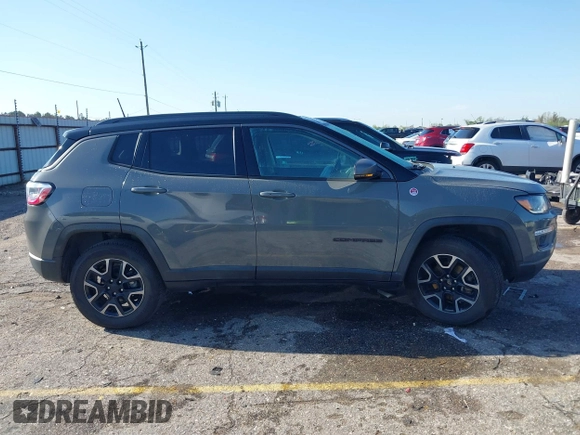 2019 Jeep Compass Trailhawk with VIN 3C4NJDDB2KT716281, listed as a IAAI auction lot 41840458 with 89,246 mi miles and . Bid and sale history available at DreamBid. Image 13.