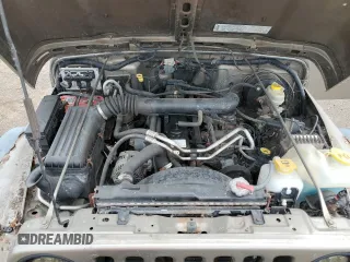 2004 Jeep Wrangler Rubicon z VIN 1J4FA69S24P713388, wystawiony jako Copart lot #61196515 z przebiegiem 155 092 mil mil oraz Czysty tytuł • Clean title. Historia ofert i sprzedaży dostępna na DreamBid. Obrazek 12.