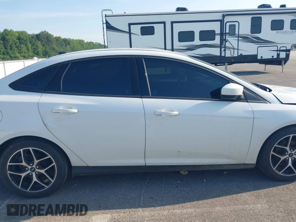 2018 Ford Focus SE с VIN 1FADP3F2XJL276733, выставлен на аукционе IAAI как лот 42537089 с пробегом Не указан миль и . История ставок и продаж доступна на DreamBid. Изображение 13.