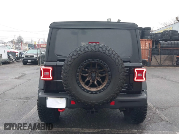 2022 Jeep Wrangler Unlimited Rubicon with VIN 1C4HJXFGXNW127064, listed as a IAAI auction lot 41491203 with 47,700 mi miles and . Bid and sale history available at DreamBid. Image 16.