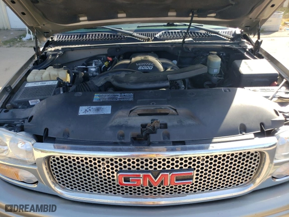 2002 GMC Yukon Denali with VIN 1GKEK63U72J274220, listed as a Copart auction lot 71891634 with 140,885 mi miles and Salvage Title. Bid and sale history available at carsss.com. Image 12.
