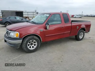 2002 Ford F-150 XL with VIN 1FTRX17W92KA57890, listed as a Copart auction lot 46894115 with 169,725 mi miles and Salvage Title. Bid and sale history available at carsss.com. Image 1.
