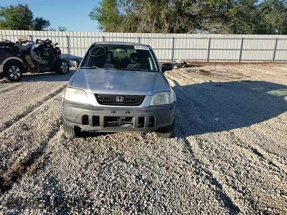 2000 Honda CR-V LX with VIN JHLRD2842YC011321, listed as a Copart auction lot 80714704 with 193,291 mi miles and Salvage Title. Bid and sale history available at carsss.com. Image 12.