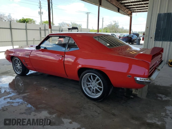 1969 Pontiac Firebird z VIN 223379ULL6573, wystawiony jako Copart lot #57812295 z przebiegiem 142 mil mil oraz Tytuł czysty. Historia ofert i sprzedaży dostępna na DreamBid. Obrazek 2.
