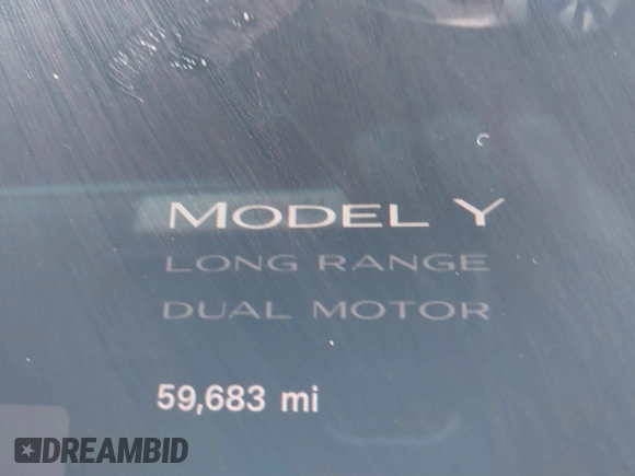 2022 Tesla Model Y Long Range z VIN 7SAYGDEE6NF451259, wystawiony jako IAAI lot #41200775 z przebiegiem 59 683 mil mil oraz . Historia ofert i sprzedaży dostępna na DreamBid. Obrazek 16.