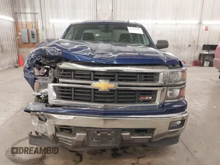 2014 Chevrolet Silverado 1500 LT with VIN 1GCVKREC2EZ155062, listed as a IAAI auction lot 41260471 with 135,762 mi miles and . Bid and sale history available at DreamBid. Image 13.