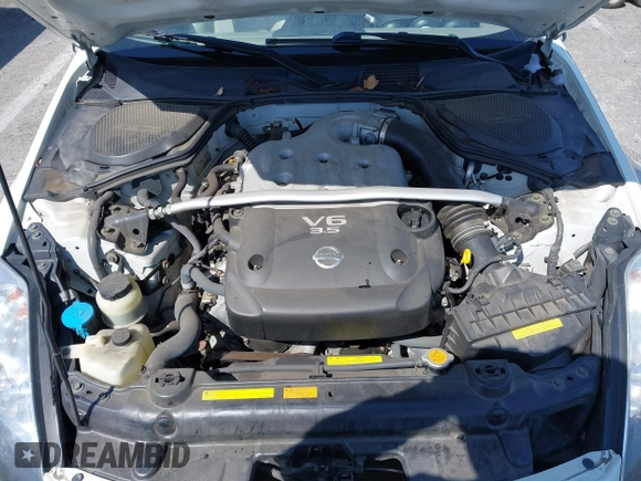 2005 Nissan 350Z Touring z VIN JN1AZ36A45M759863, wystawiony jako IAAI lot #41989643 z przebiegiem 36 758 mil mil oraz . Historia ofert i sprzedaży dostępna na DreamBid. Obrazek 10.