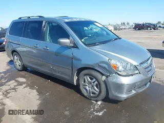 2007 Honda Odyssey EX-L z VIN 5FNRL387X7B019023, wystawiony jako IAAI lot #42195257 z przebiegiem 274 747 mil mil oraz . Historia ofert i sprzedaży dostępna na DreamBid. Obrazek 1.