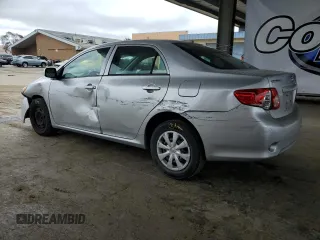 2010 Toyota Corolla with VIN 1NXBU4EE8AZ187793, listed as a Copart auction lot 63909235 with 65,164 mi miles and Salvage title. Bid and sale history available at DreamBid. Image 2.