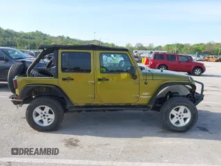 2007 Jeep Wrangler Unlimited Sahara with VIN 1J4GA59177L182593, listed as a IAAI auction lot 42104934 with 158,990 mi miles and . Bid and sale history available at DreamBid. Image 13.