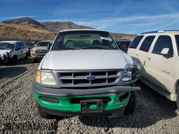 1998 Ford F-150 with VIN 1FTZF1821WKB21778, listed as a Copart auction lot 73009444 with 220,898 mi miles and Salvage title. Bid and sale history available at DreamBid. Image 5.