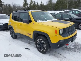 2015 Jeep Renegade Trailhawk with VIN ZACCJBCT9FPB95949, listed as a IAAI auction lot 41558291 with 60,682 mi miles and . Bid and sale history available at carsss.com. Image 1.