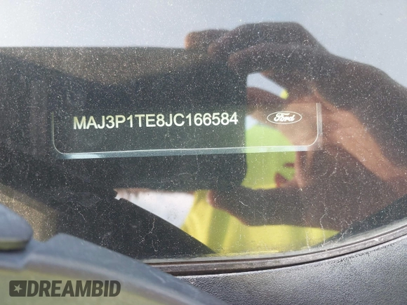 2018 Ford EcoSport SE z VIN MAJ3P1TE8JC166584, wystawiony jako IAAI lot #41674770 z przebiegiem 98 603 mil mil oraz . Historia ofert i sprzedaży dostępna na DreamBid. Obrazek 9.
