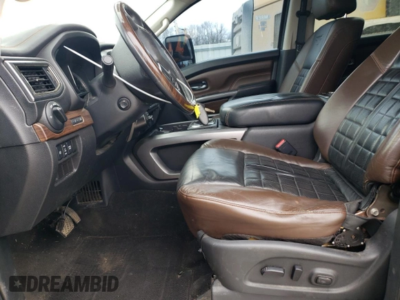 2016 Nissan Titan Pro-4X с VIN 1N6BA1F48GN500861, выставлен на аукционе Copart как лот 46651195 с пробегом 235 134 миль миль и Списание • Salvage title. История ставок и продаж доступна на DreamBid. Изображение 7.