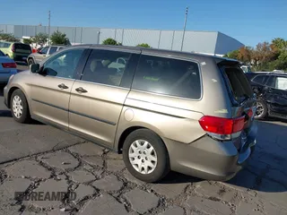 2010 Honda Odyssey LX with VIN 5FNRL3H2XAB030650, listed as a IAAI auction lot 42386287 with 146,161 mi miles and . Bid and sale history available at DreamBid. Image 3.