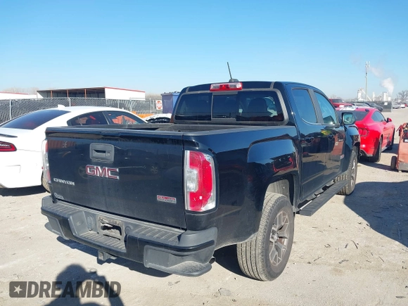2016 GMC Canyon 4WD SLE with VIN 1GTG6CE30G1381435, listed as a IAAI auction lot 41642964 with 130,490 mi miles. Bid and sale history available at carsss.com. Image 4.